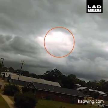 Onlookers Witness Figure Walking In The Clouds