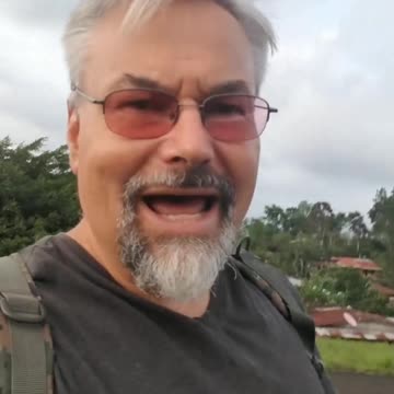 PEOPLE USE THE RUNWAY IN SAN VITO, COSTA RICA AS A PARK