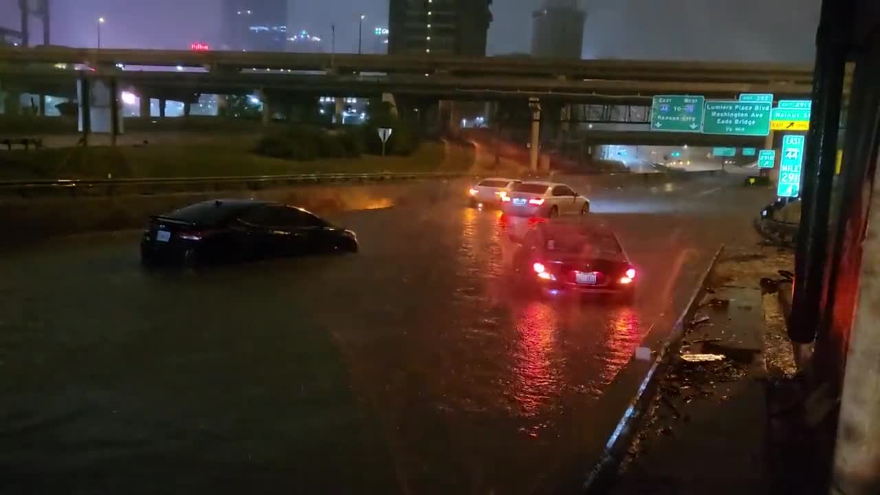 Several cars stuck in flood water on I-44 in Downtown St. Louis.