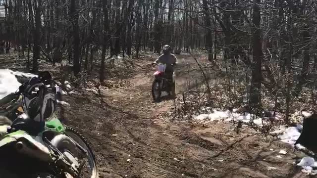 Guy red dirt motorcycle flip lands on him