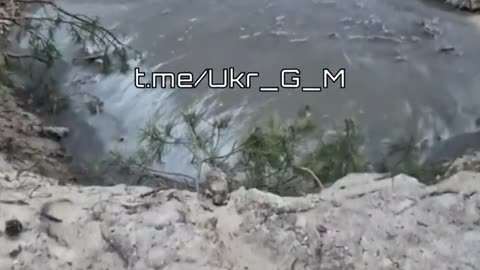 Ukrainian soldier shows the remains of an Ukrainian position after it got hit by a FAB-500