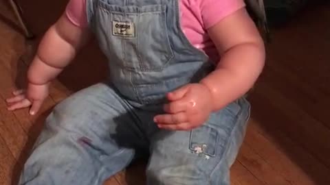 Little Girl Plays With Bird Buddy