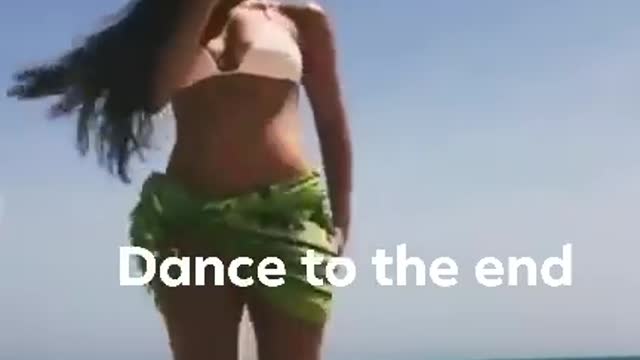 Sexy women dancing on the sea