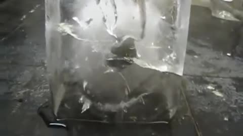 Red Hot Nickel Ball On Ice.mp4