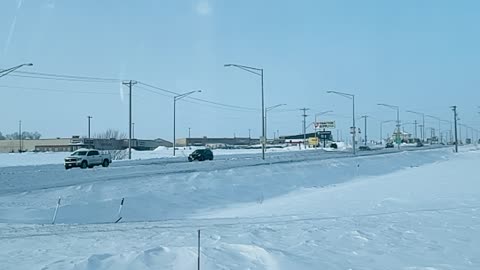 Slow drive in the snow