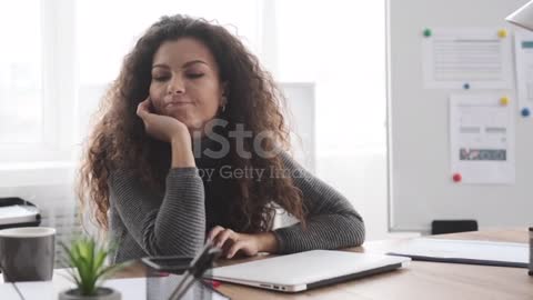 Businesswoman broken after receiving bad news on laptop