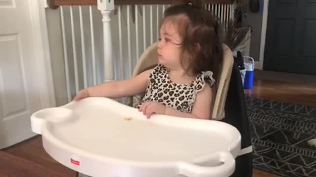 Baby girl is shocked after Google Assistant speaks back to her