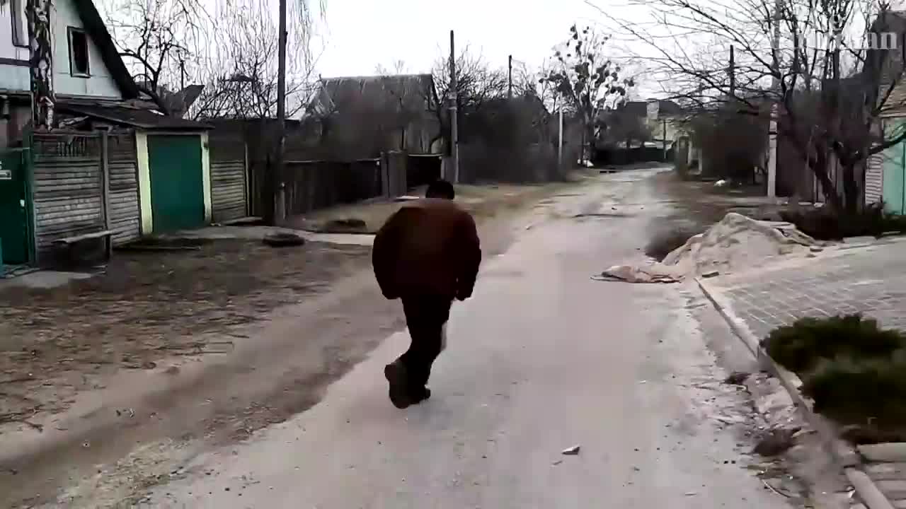 Journalists and residents run from shelling in Irpin, Ukraine