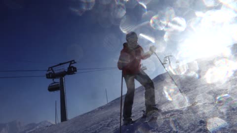 Skier wipes out friend with cloud of snow