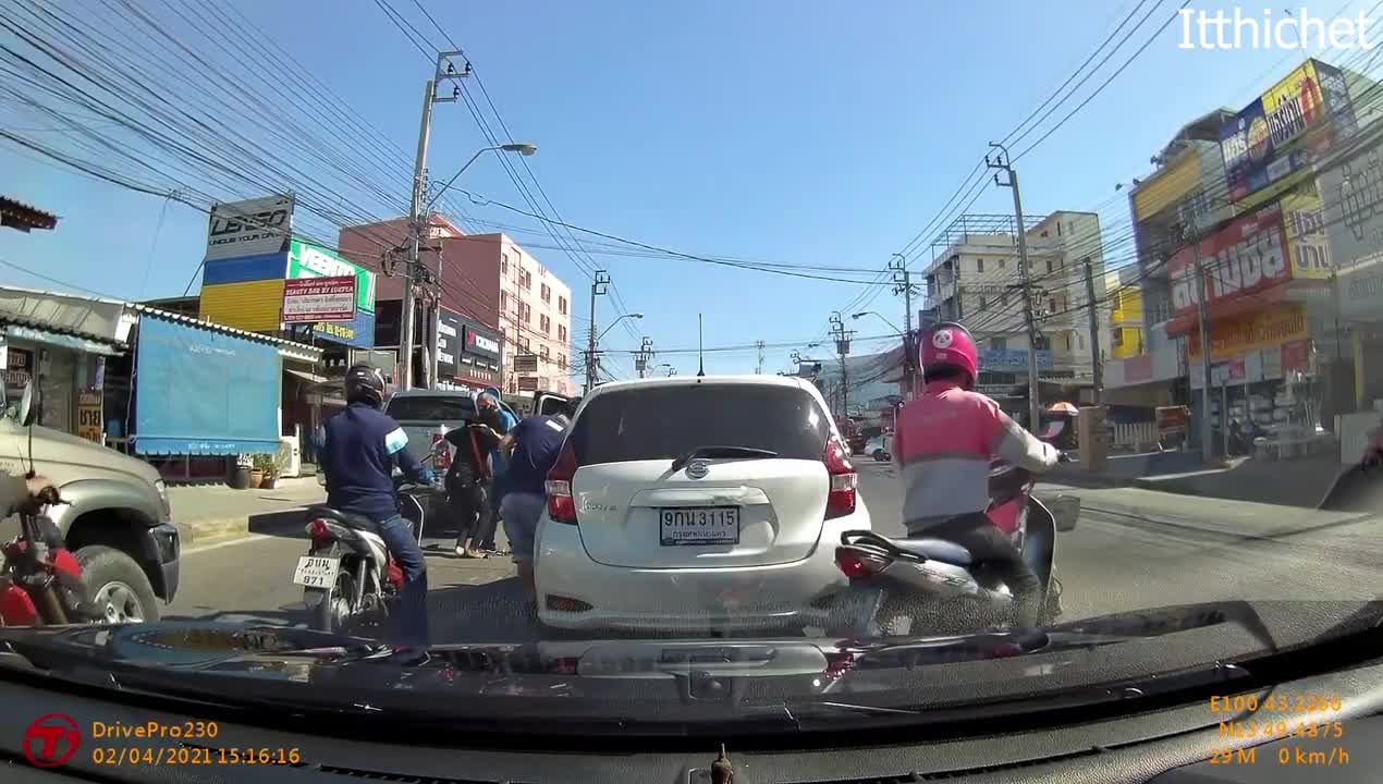 Lane-Splitting Motorcyclist Meets Open Car Door