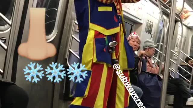 Clown on subway train blows up a balloon animal using his nose