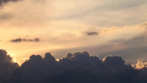 Thick ink-colored clouds squeezed the sky