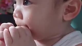 My cute baby eating while watching tv😍
