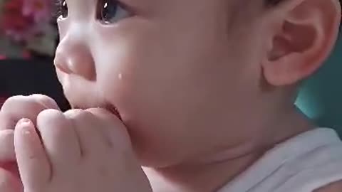 My cute baby eating while watching tv😍