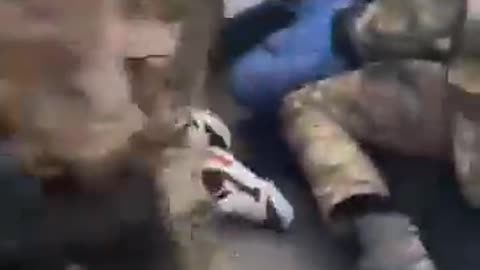Ukrainian soldiers beating ukrainian civilians
