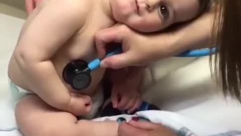 So sweet Baby boy Rests Head on nurss Hand lovye