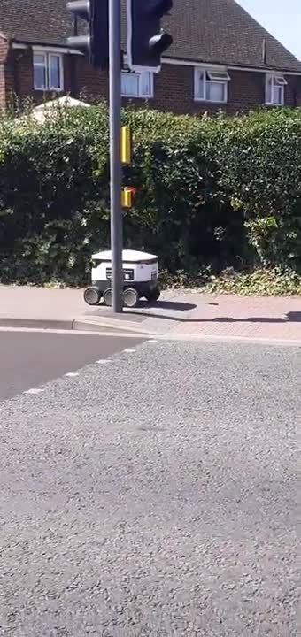 Helping a Starship Grocery Delivery Robot Cross Road Safely