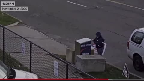 US Postal worker visiting the same drop box with stacks of ballots.