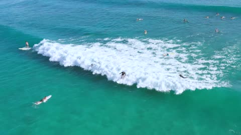 People Surfing On The