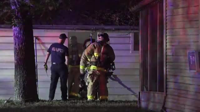 Homeowner alerted by neighbor that garage was on fire, preventing spread of flam