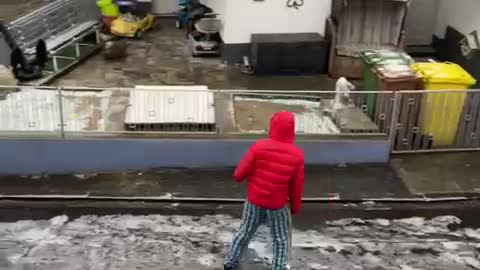 Guy Slides Down Entire Icy Road
