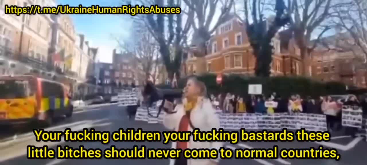 Ukro "refugees" outside Russian consulate in London calling for the murder of all Russian children