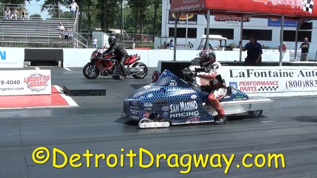 Motorcycle vs Snow Mobile at Milan Dragway