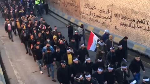 Supporters and fans of the popular crowd chanting from the Bab al-Sharqi tunnel in the center of