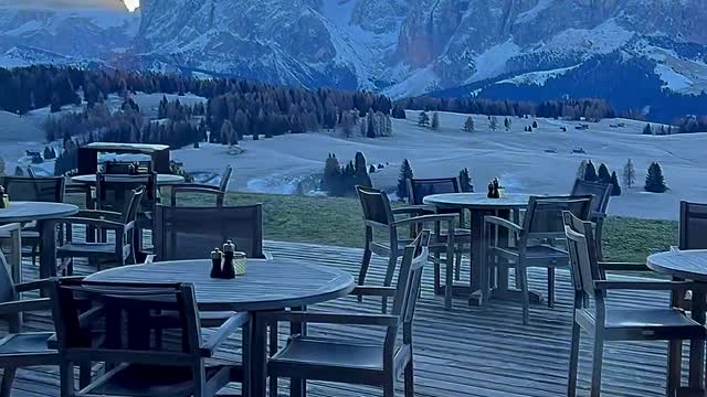 Having breakfast with a magical sunrise on the Alpe di Siusi