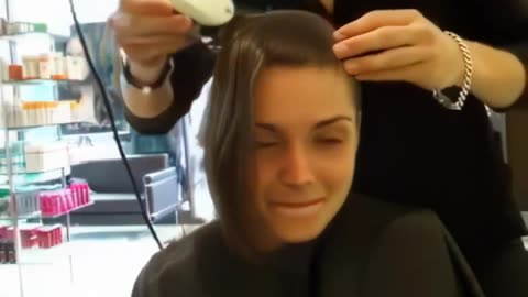 Nervous girl gets a buzzcut