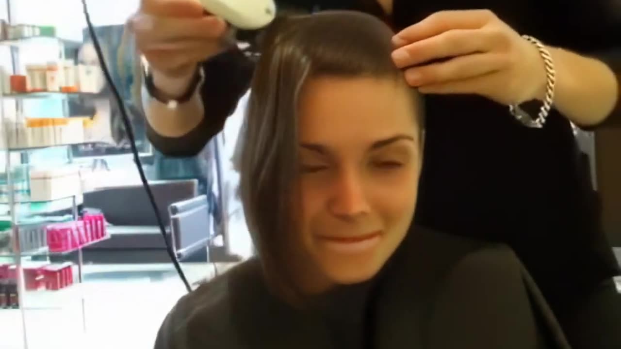 Nervous girl gets a buzzcut