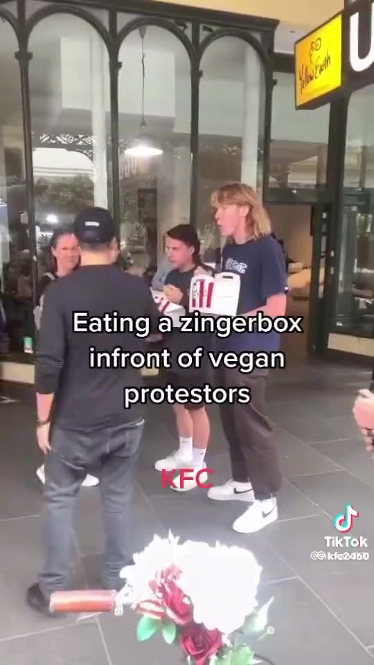 Eating KFC in front of vegan protesters...hilarious
