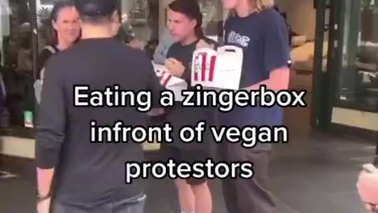 Eating KFC in front of vegan protesters...hilarious