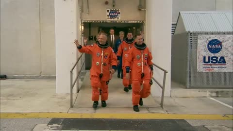 STS-135 Crew Suitup and Walkout