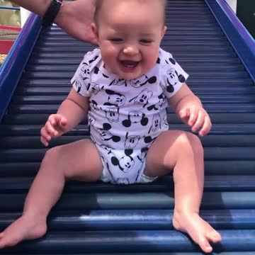 Baby girl preciously dances to 'Footloose' theme song