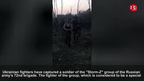 Ukrainian soldiers remove the captured Russian from the battle zone like this