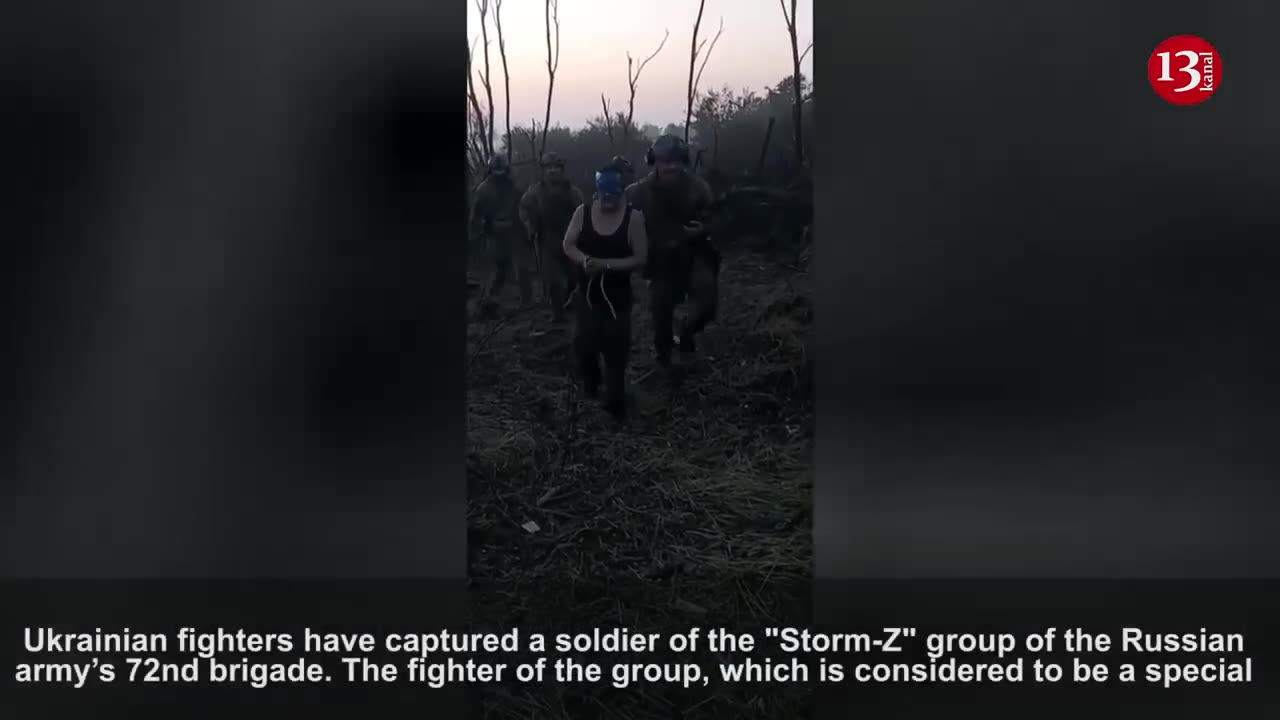 Ukrainian soldiers remove the captured Russian from the battle zone like this