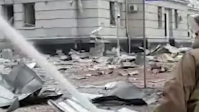 A Ukrainian government building in Kharkiv burns amid Russian shelling