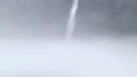 This waterfall looks like it's flowing out of the sky