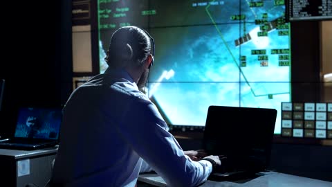 Man working on space center