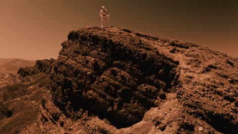 An Astronaut standing near the edge of a cliff