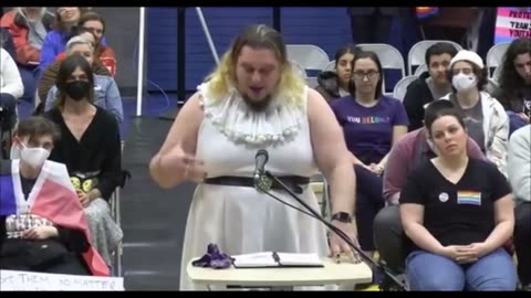 A trans or crossdresser gives a fiery speech at a pedagogical meeting in a California school