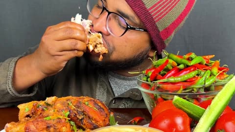 grilled chicken and spicy chilli eating
