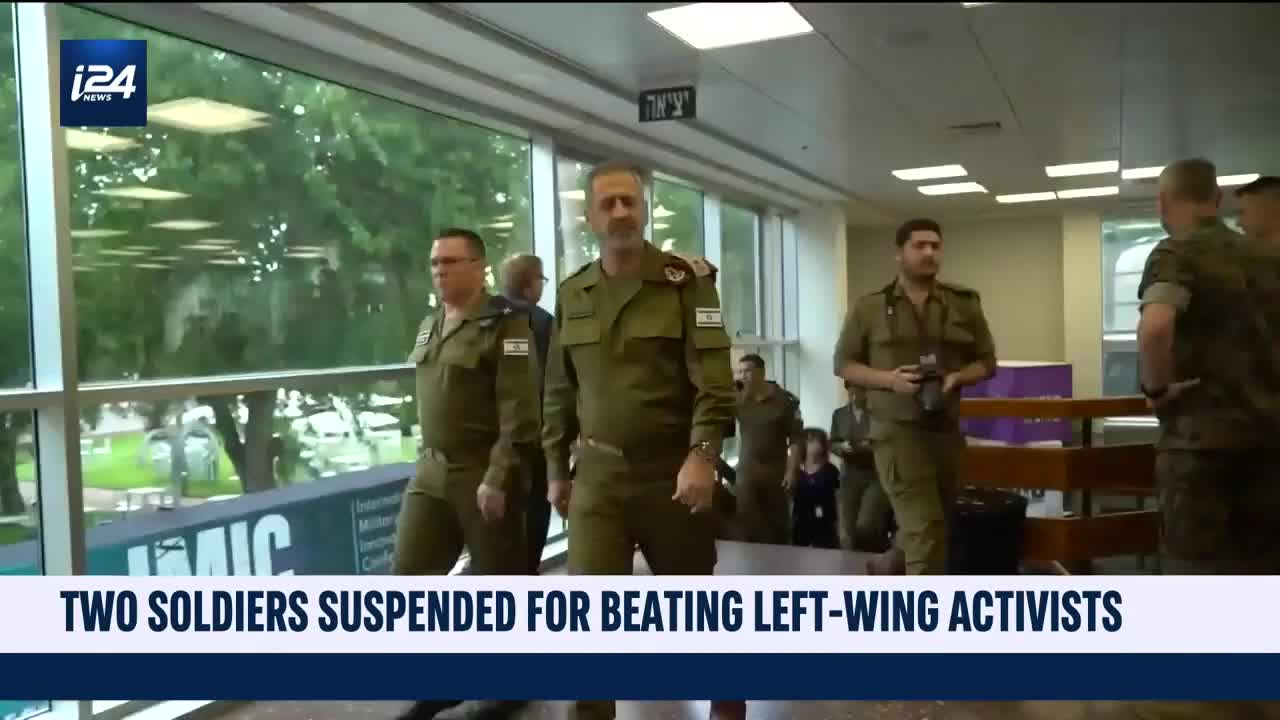 Two Israeli soldiers suspended for beating left-wing activists