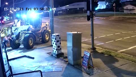 Australian on digger rams shop, steals motorbikes