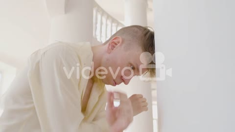 Close Up View Of Man Dancer Dancing Leaning On A Column In The Studio