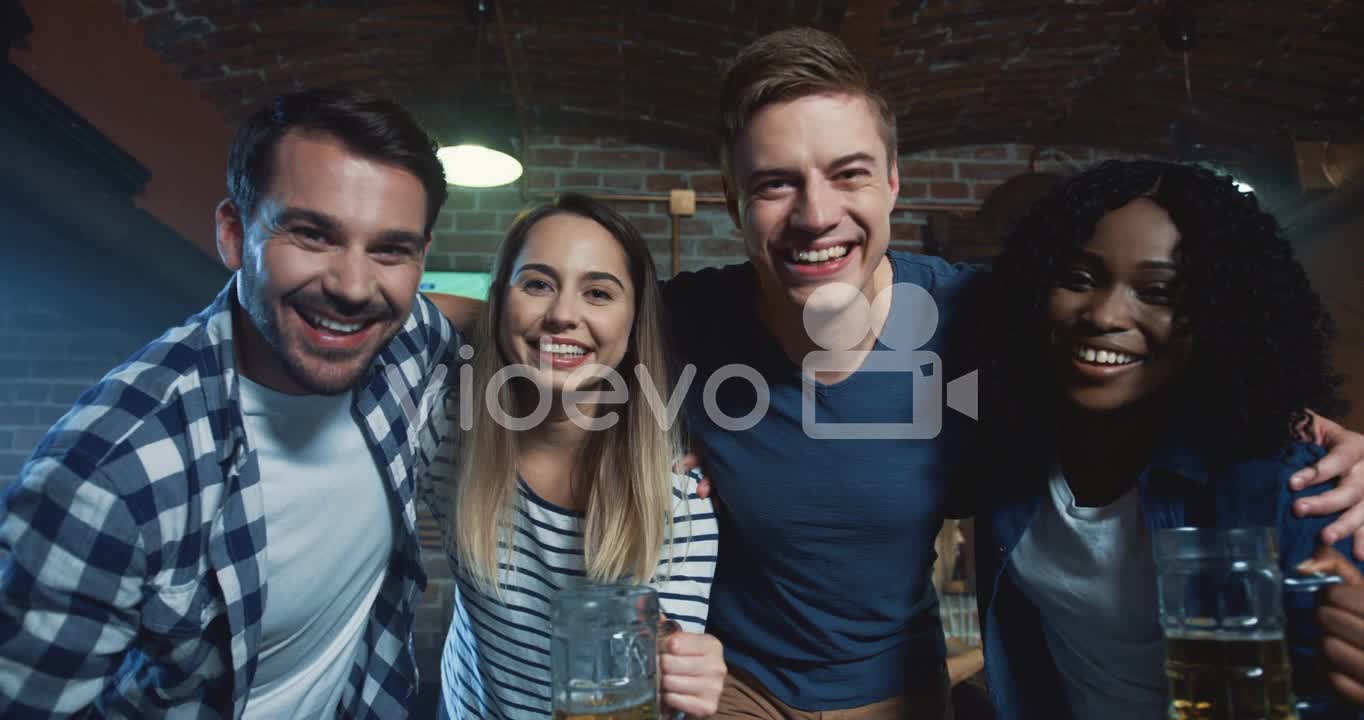 Multiethnic Friends Men And Women Hugging, Smiling And Looking At Camera