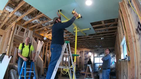 Started to sheet rock the basement ceiling