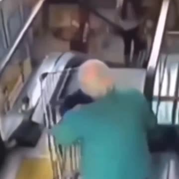 Old lady having trips at an escalator