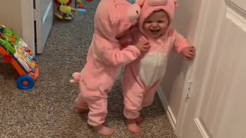 Happy twin baby moment